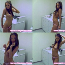 Ashley gets naked while doing laundry