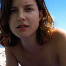 Laura gets naked on the beach and enjoys a little bit of fun in the sun!