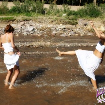 The Girls Taking A Dip in the River