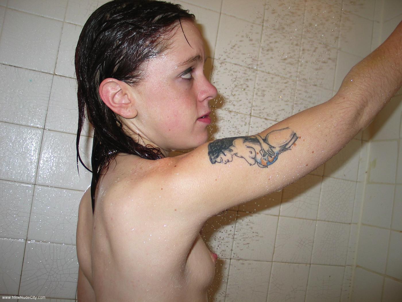 Unshaven teen takes a shower