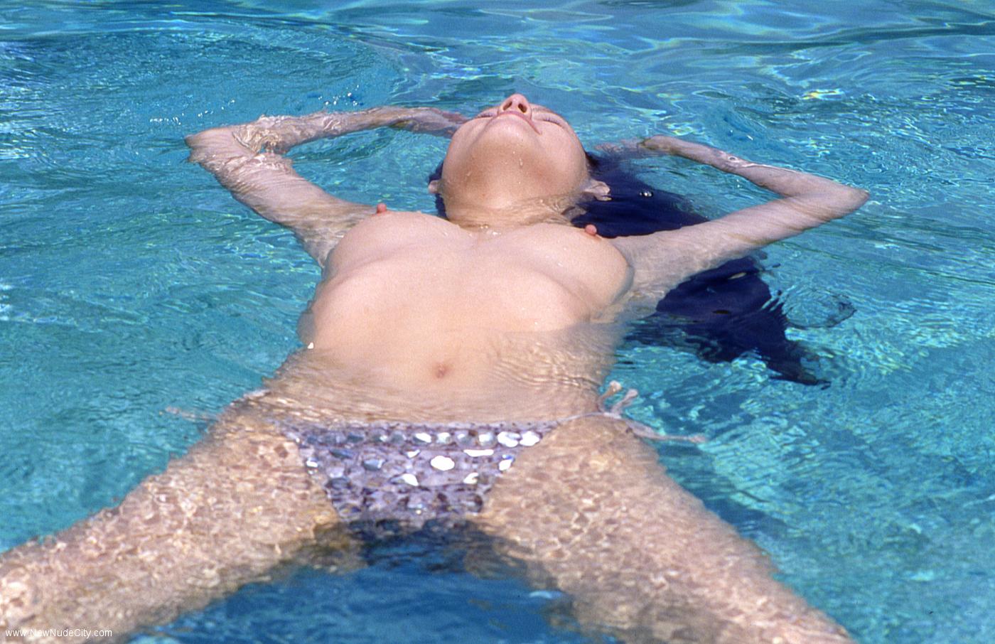 Join sweet teen Randi for a naked swim
